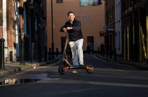 Electric adult scooters with suspension